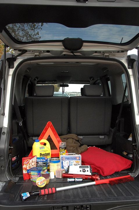 An emergency kit packed in the back of a car